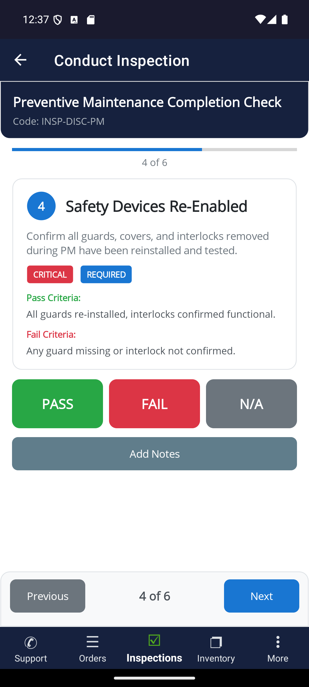 ProAlert mobile inspection in progress on a technician's phone, step four of six of a preventive maintenance completion check, showing the critical and required checkpoint Safety Devices Re-Enabled with its instruction to confirm all guards, covers and interlocks removed during the PM have been reinstalled and tested, the pass criteria and the fail criteria beneath it, and large Pass, Fail and N/A buttons with an Add Notes action and Previous and Next navigation